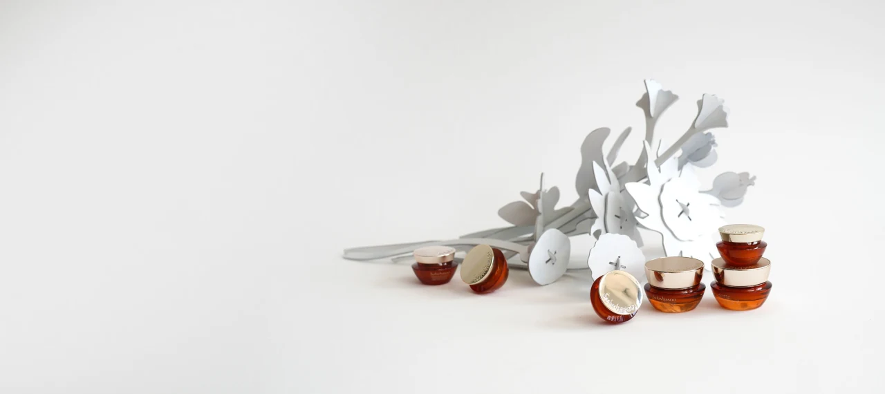 Sulwhasoo ginseng cream jars beside a white botanical sculpture for the September 2026 Cj Hendry collaboration